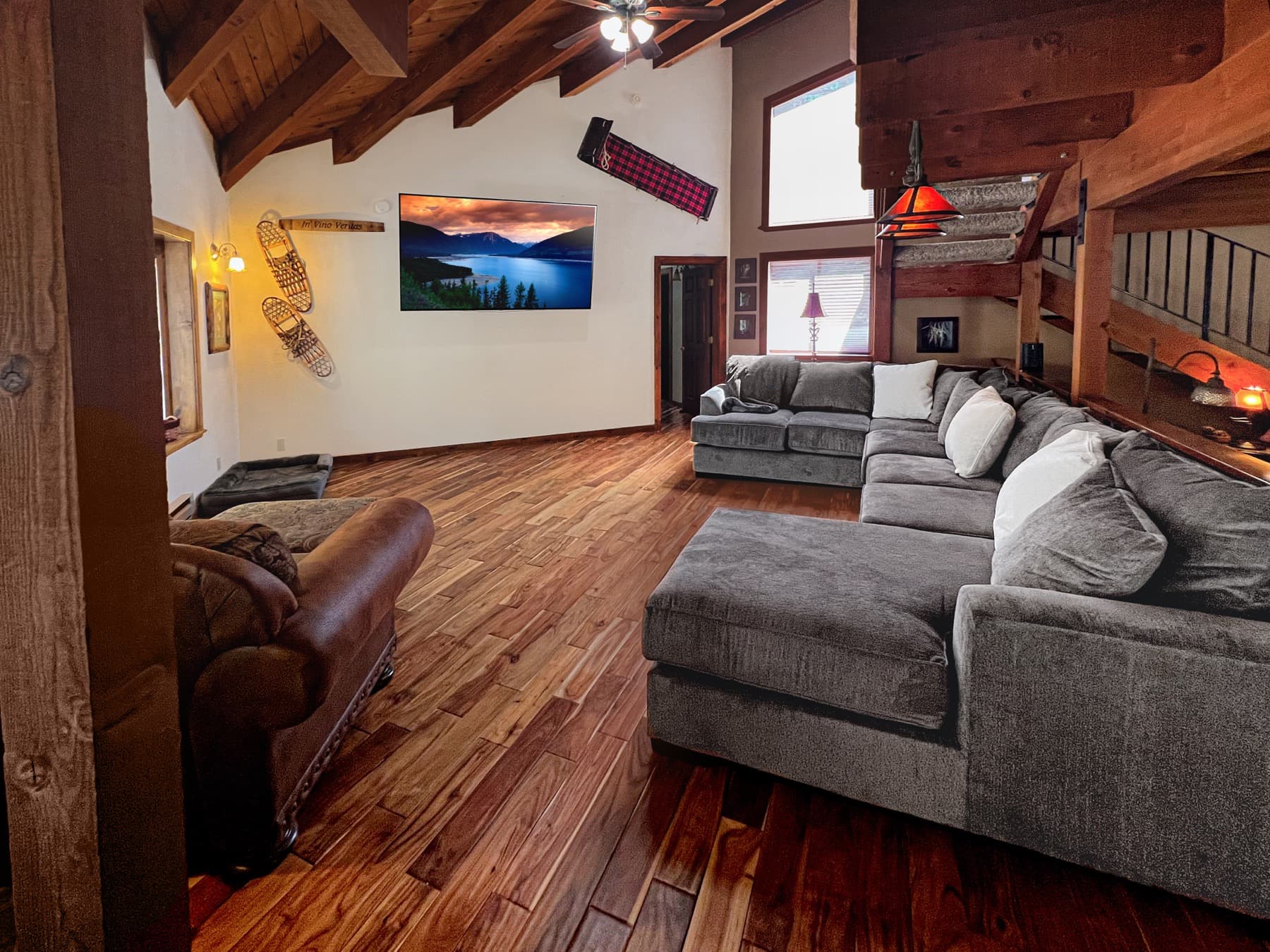 Cozy family room with stone fireplace and comfortable seating